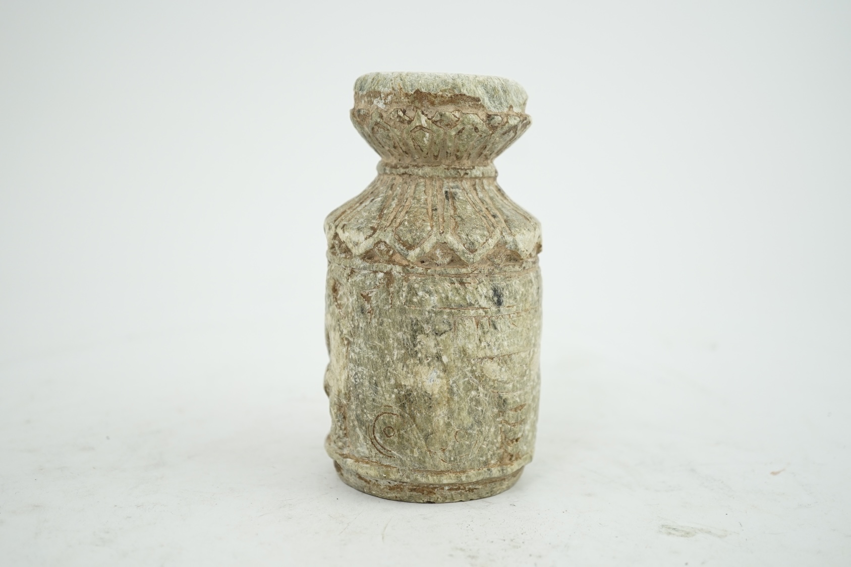 A Gandharan Buddhist carved schist stem cup